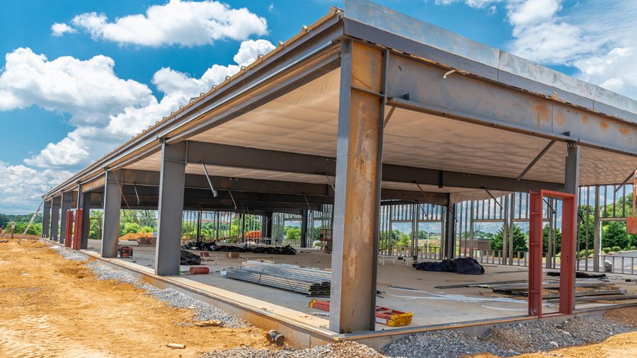 Structural steel frame of a new single-storey commercial building under construction